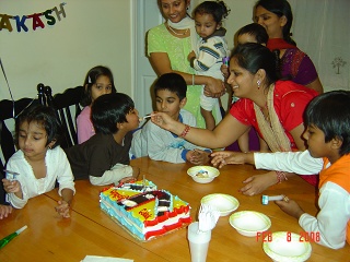 Mom feeding cake